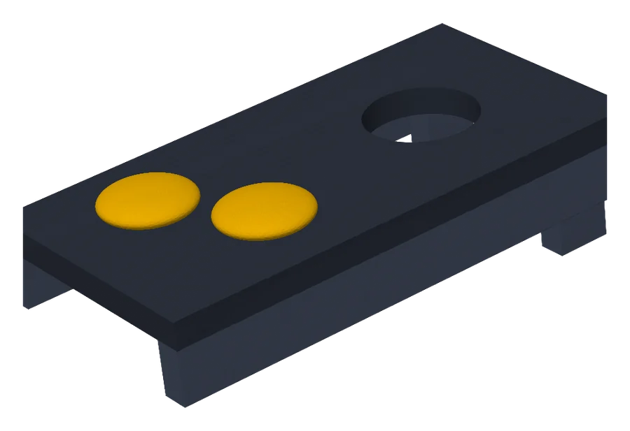 Mini cornhole board painted navy with two yellow bean bags